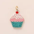 Detail of a colorful cupcake charm with pink frosting and a red cherry topper - Pendant Only / Cupcake