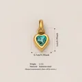 Gold-plated 316 stainless steel heart pendant featuring a cyan crystal birthstone - December Birthstone Pendant / Gold