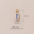 Elegant oval copper pendant charm with blue Amore script on white enamel background - No. 5 Amore Pendant