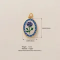 Vintage style oval copper pendant with blue rose design and polka dot border, 22mm x 14mm - Single Orchid (1)