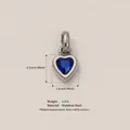 Stainless steel heart pendant with blue birthstone and size measurement markings. - September Birthstone Pendant / Steel