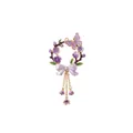 Detailed view of lavender floral wreath pendant with purple butterfly and gold chain tassels - February Flower Pendant
