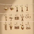 Variety of 15 gold-plated stainless steel tool charms for DIY jewelry making - No. 4 Spoon Pendant