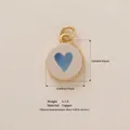 Gold-plated round copper pendant with a blue heart motif, jewelry charm accessory - Blue Heart (9)