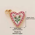 Exquisite vintage heart-shaped copper pendant with rose pattern and dimensions shown. - Pink Heart Rose Pendant