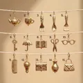 Lot de 15 breloques DIY en acier inoxydable doré avec divers motifs du quotidien - Suspension Lumineuse De Décembre