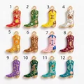 Detailed view of twelve colorful zodiac cowboy boot enamel pendants with gold accents - Aries Boot Pendant