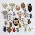 Detailed selection of 25 vintage ceramic pendants in heart, key, and teardrop shapes. - Heart Vine Pendant (1)