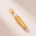 Detail view of a vintage gold candle pendant with a brilliant-cut stone and melting wax effect - Candle Pendant