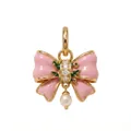 Macro detail of a pink enamel bowknot pendant featuring sparkling crystals and a dangling pearl - Bowknot Pendant
