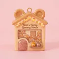 Detailed view of fairy tale house pendant featuring a cute bear honey shop design - Bear's Honey House Pendant