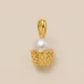 Detailed view of elegant golden ice cream cone charm with a large white pearl - Waffle Cup Cake Pendant