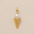 Close-up detail of a gold ice cream cone charm with a lustrous white pearl scoop. - Waffle Cone Pendant