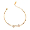 Macro detail of double-layer gold-plated titanium steel bracelet with zircon charms. - Pave Square Piece Small Gold Bead Style / Gold