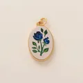 Elegant oval pendant featuring a blue rose floral pattern in 18K gold plated frame - Oval Blue Rose Style