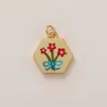 Elegant hexagonal gold pendant featuring colorful enamel flower bouquet on cream background - Three Flowers
