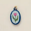 Charming blue oval enamel pendant featuring a pink tulip flower design with gold ring - Tulip Pendant