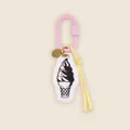 Detail shot of a retro hand-drawn ice cream swirl pendant charm for bags and keyrings - Sakura Pink Ice Cream Style