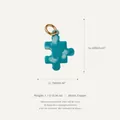 Detail shot of a teal puzzle piece jewelry charm with cloud pattern and size dimensions - 12 Puzzle