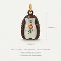 Macro detail of a cute hedgehog pendant in stainless steel with 18k gold plating info - Hedgehog Pendant