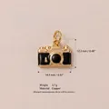 Detailed view of a gold and black camera-shaped copper pendant with dimensions - No.12 Camera Pendant