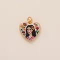 Detailed view of a gold-rimmed heart pendant featuring a romantic floral woman illustration. - Floral Portrait Heart Pendant