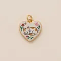 Detailed close-up of a heart-shaped gold pendant featuring an embroidered sleeping cat design - Sleeping Cat Heart Pendant