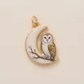 Close-up detail of a golden barn owl charm on a white enamel crescent moon pendant - Owl Moon Pendant