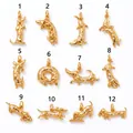 Showcases multiple styles of gold-toned dachshund pendants with zircon accents. - Standing Dachshund Pendant (MQPK262707SI) (Pendant Only) / Gold