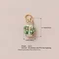 Detailed SKU image of a green patterned pig pendant with 18K gold PVD plating - White Mouse Pendant