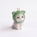 Detailed view of a handcrafted ceramic crying cat pendant wearing a cute green fruit hood. - Pendant Only / Green Ear Cat Pendant