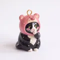 Detailed close-up of a cute ceramic cat charm wearing a pink bear hat for DIY jewelry - Pendant Only / Pink Bear Cat Pendant
