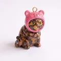 Detailed view of grumpy tortoiseshell cat charm wearing a cute pink bear hat - Pendant Only / Tabby Pink Bear Cat Pendant