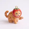 Detailed macro shot of a cute angry ginger cat pendant wearing a strawberry hat - Pendant Only / Tomato Cat Pendant