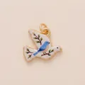 Detail of retro painted bird pendant with blue bird and branch design for DIY jewelry - Blue Pigeon on Branch Pendant