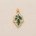 Detail view of a vintage painted oak leaf pendant with acorn motif for DIY jewelry - Oak Leaf Relief Pendant