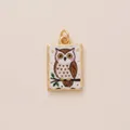 Macro view of a charming vintage hand-painted owl pendant charm in gold-tone finish - Owl Square Pendant