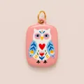 Close-up view of a hand-painted enamel owl pendant charm featuring a red heart detail - Owl Square Tag Pendant