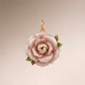 Close-up detail of a vintage pink enamel rose pendant with gold edges and pearls - November Camellia Pendant Only (Without Chain)