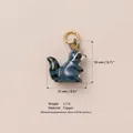 Detailed macro view of cute enamel raccoon pendant with size and material specifications - Raccoon