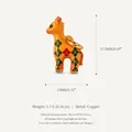 Cartoon animal charm in copper, yellow with green and red diamond patterns, 17.5mm height. - Floral Deer