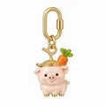 Detailed view of a cute pink pig charm with carrot straw hat and gold clasp. - Carrot Pig Pendant