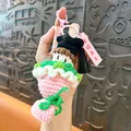 Handmade crochet graduation doll keychain featuring a flower bouquet and mortarboard hat - Pink Graduation Bouquet / Pink