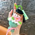 Handmade crochet graduation doll keychain with black cap and pink flower dress gift - Green Graduation Bouquet / Green