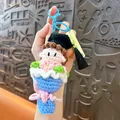 Handmade crochet graduation doll keychain with flower bouquet and elegant black tassel - Impressive Graduation Bouquet / Blue