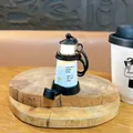 Creative lighthouse keychain with LED light, healing design for bags or car keys. - Black