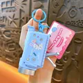 Light blue camera-shaped projector keychain with a cute rabbit cartoon and pink tag - Fun Projector Camera Pendant / Blue
