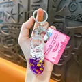 Llavero creativo de bota de fútbol con arena movediza violeta y estrellas doradas - Púrpura