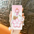 Cute pink flower keychain with white woven rope and smiley face leather tag charm - Flower Pendant / Pink