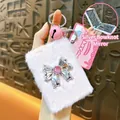 Handheld pink plush folding mirror keychain featuring a decorative silver bow charm - Bowknot Folding Mirror Pendant / Pink